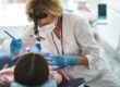 dentist performing dental emergency care