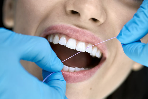 dental health services (3) patient mouth receiving dental health services