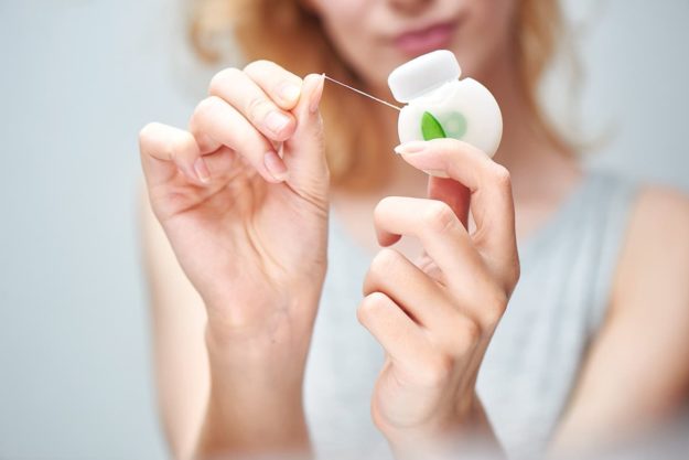 flossing benefits woman understanding flossing benefits