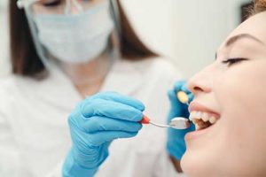 patient getting dental exam